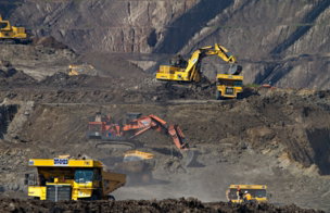 photography-of-excavators-at-mining-area.jpg photography of excavators at mining area